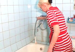 Fisting and gape featured in a bathroom vide